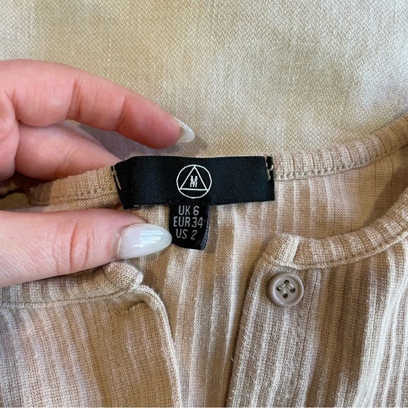 Cream/coral cozy bodysuit with buttons up the front - Picture 6 of 9